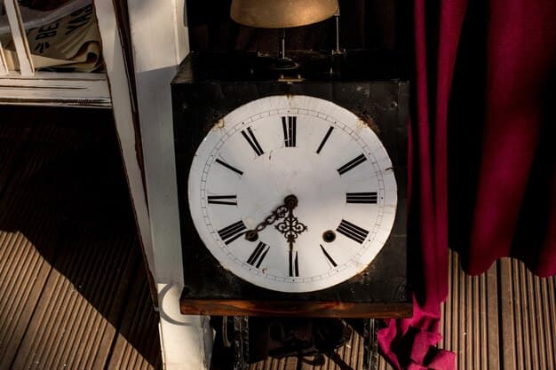 An antique clock standing on a table